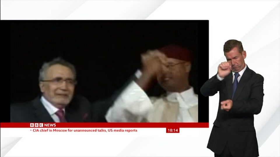 Broadcast still at 14m. BBC News, Signed: BBC News at Six, 25 August 2026.