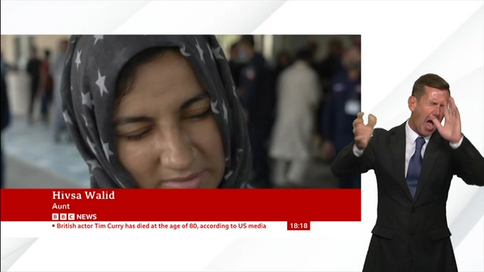 Broadcast still at 18m. BBC News, Signed: BBC News at Six, 26 August 2026.