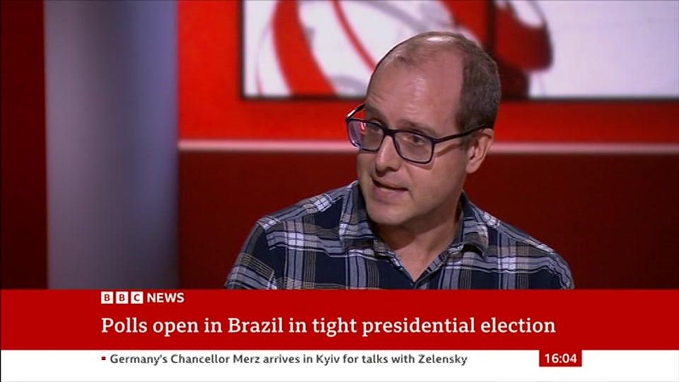 Broadcast still at 4m. BBC News, 4 October 2026.