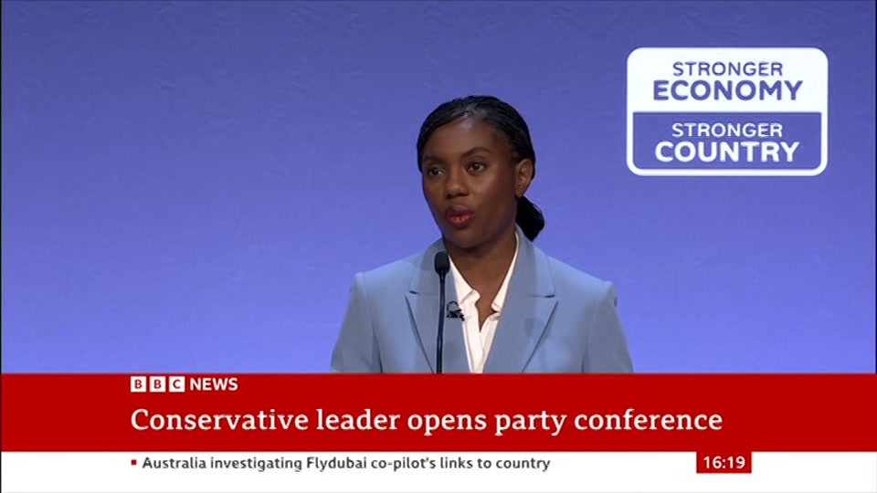 Broadcast still at 19m 30s. BBC News, 4 October 2026.