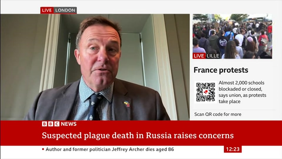 Broadcast still at 23m. BBC News, BBC News Now, 6 October 2026.