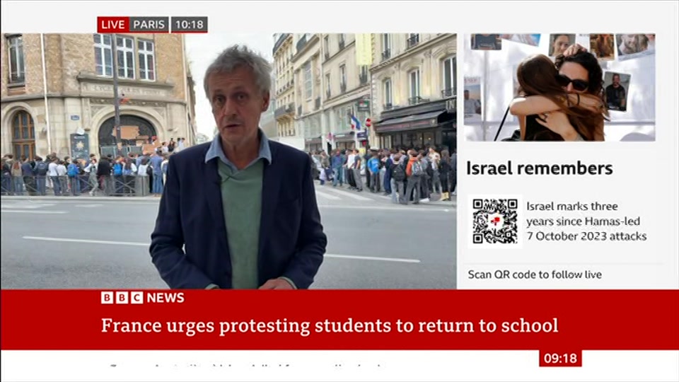 Broadcast still at 18m 30s. BBC News, 7 October 2026.