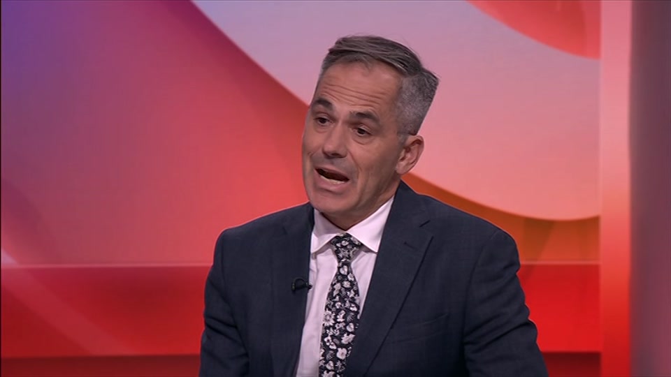 Broadcast still at 19m. BBC One, BBC News and Weather, 7 October 2026.