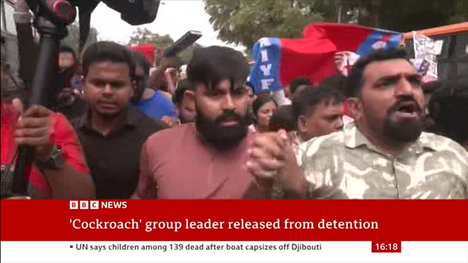 Broadcast still at 18m 30s. BBC News, 11 October 2026.