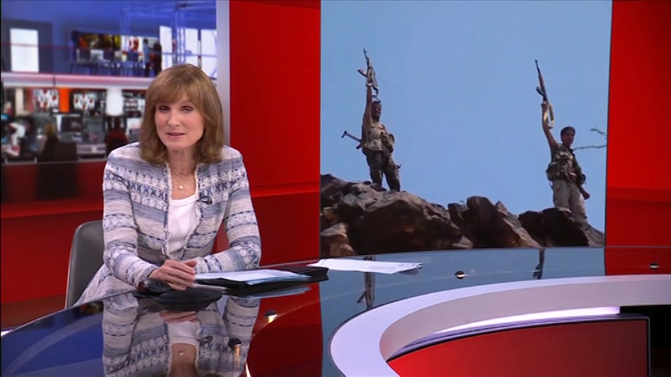Broadcast still at 13m 30s. BBC One, BBC News, 12 October 2026.