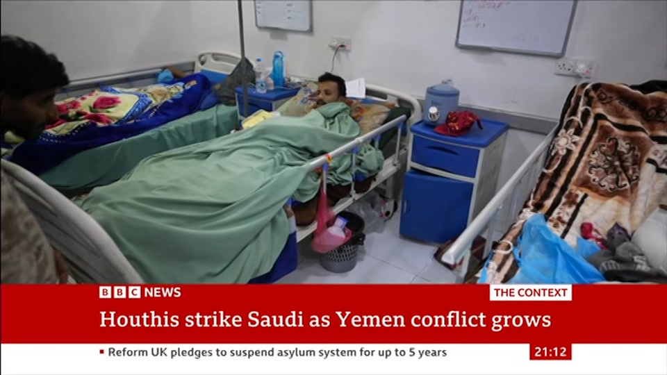 Broadcast still at 12m. BBC News, The Context, 12 October 2026.