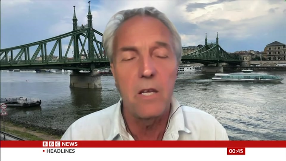 Broadcast still at 15m. BBC News, Newscast, 12 October 2026.