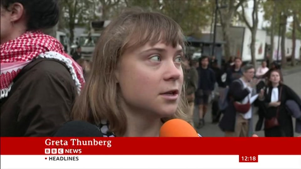 Broadcast still at 18m 30s. BBC News, BBC News Now, 13 October 2026.
