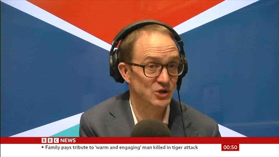Broadcast still at 20m 30s. BBC News, Newscast, 14 October 2026.