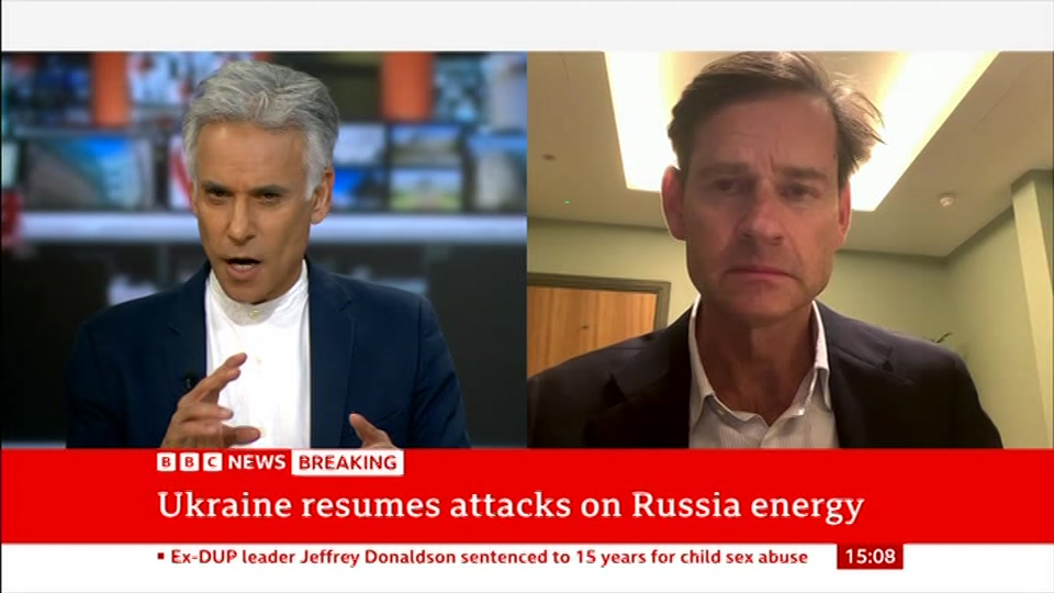 Broadcast still at 8m. BBC News, Verified Live, 15 October 2026.