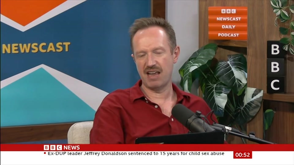 Broadcast still at 22m. BBC News, Newscast, 15 October 2026.