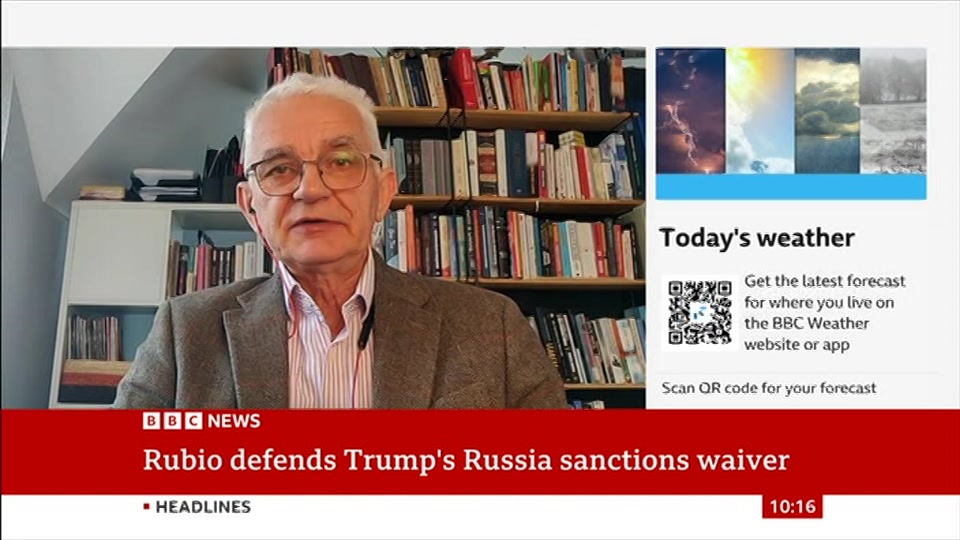 Broadcast still at 16m 30s. BBC News, 18 October 2026.