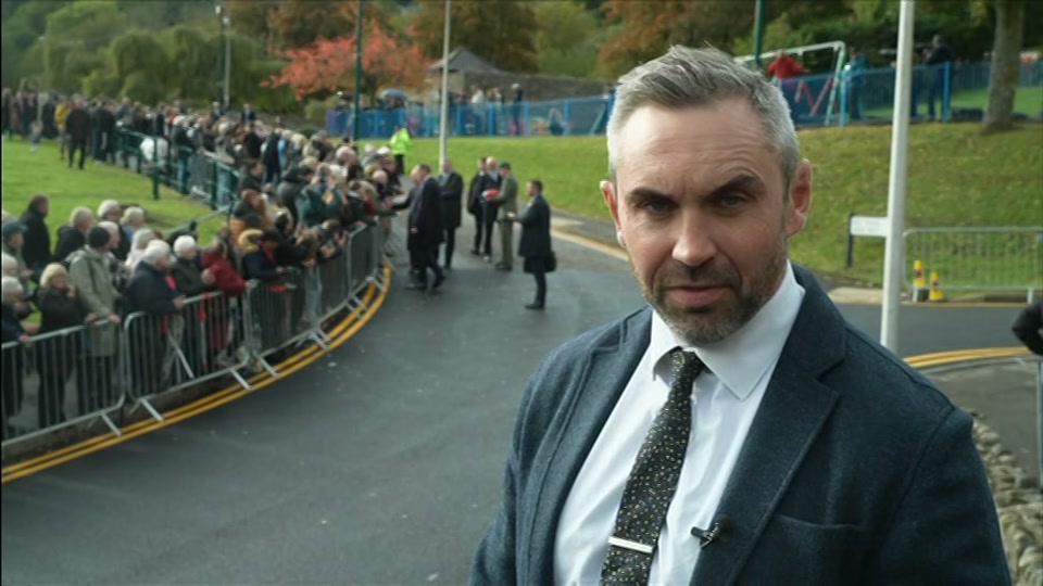 Broadcast still at 18m 30s. BBC One, BBC News at One including, 21 October 2026.