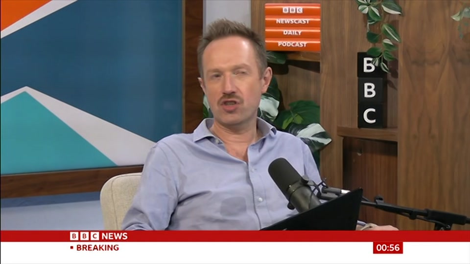 Broadcast still at 26m. BBC News, Newscast, 21 October 2026.