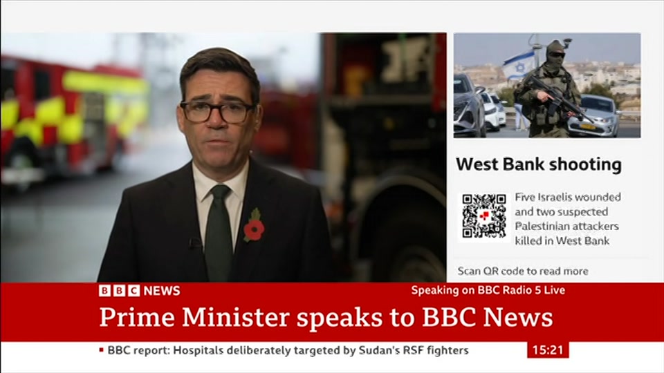 Broadcast still at 21m 30s. BBC News, Verified Live, 23 October 2026.