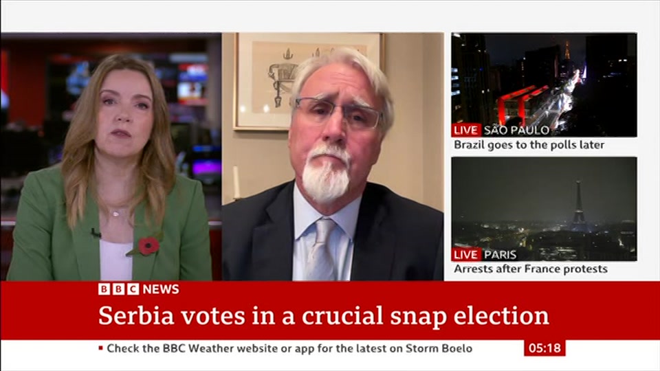 Broadcast still at 18m. BBC News, 25 October 2026.