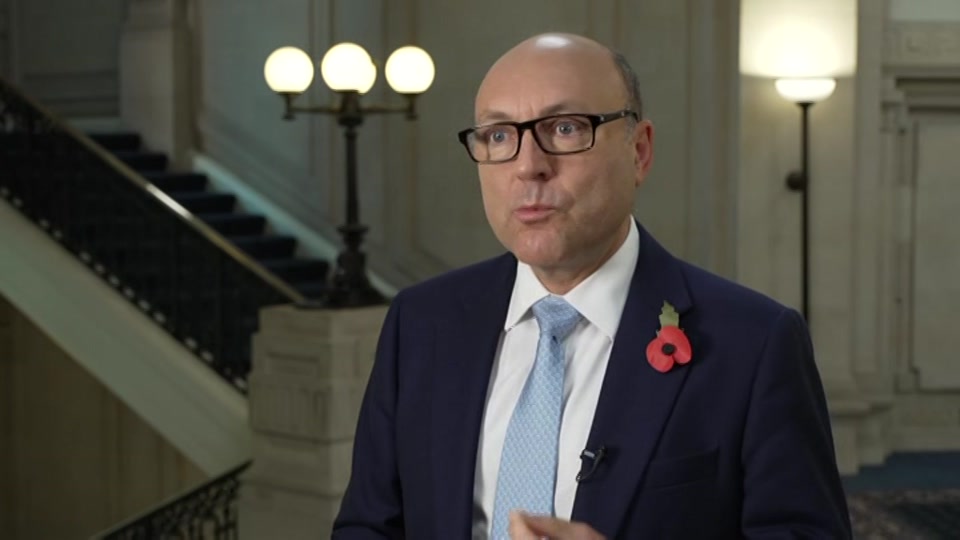 Broadcast still at 9m. ITV, ITV Evening News, 25 October 2026.