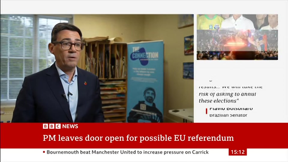 Broadcast still at 12m. BBC News, Verified Live, 26 October 2026.