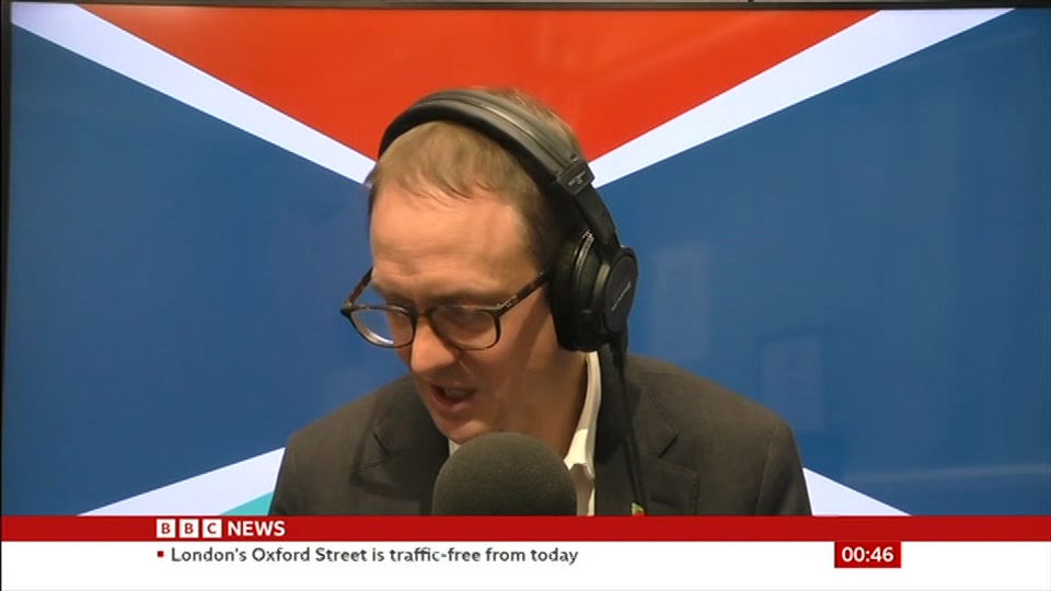 Broadcast still at 16m. BBC News, Newscast, 27 October 2026.