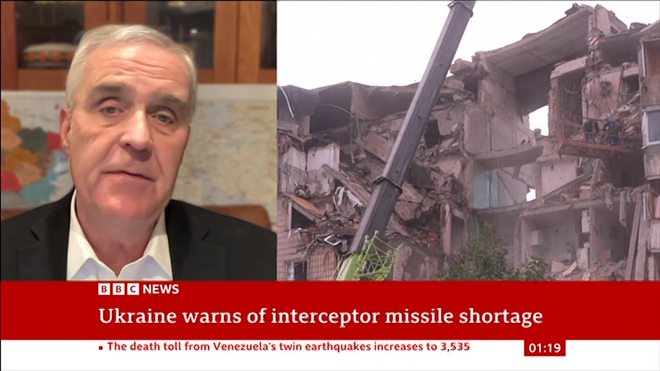 Broadcast still at 19m. BBC NEWS, BBC News, 7 July 2026.