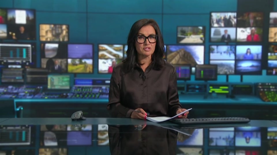 Broadcast still at 8m. ITV1, ITV Lunchtime News, 21 July 2026.