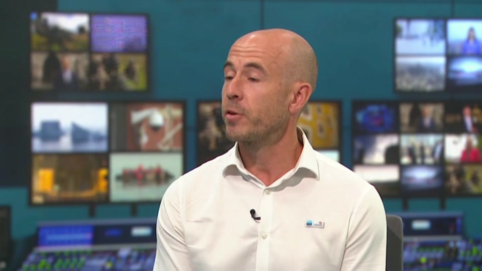 Broadcast still at 13m. ITV1, ITV Lunchtime News, 24 July 2026.