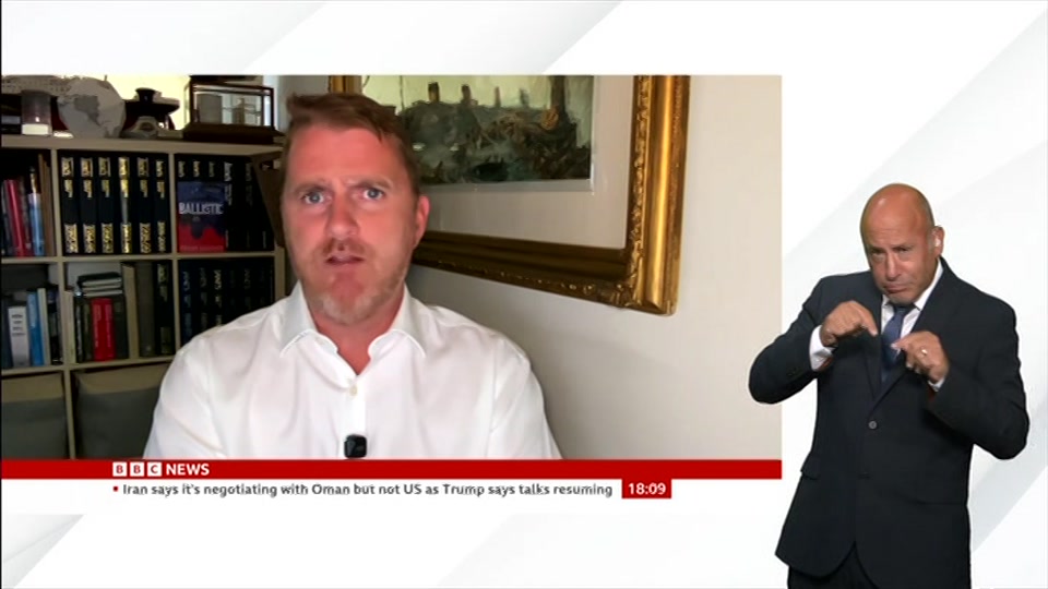 Broadcast still at 9m. BBC NEWS, Signed: BBC News at Six, 3 August 2026.