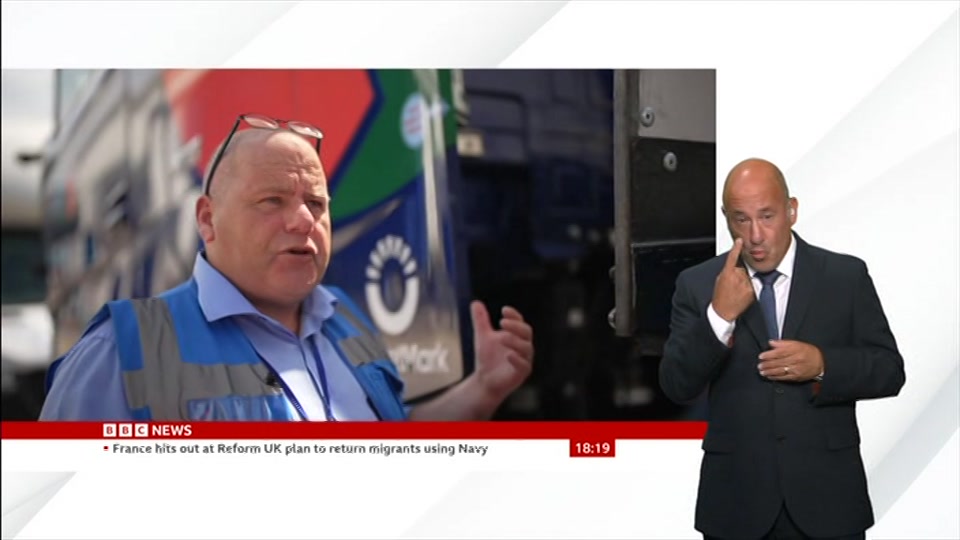 Broadcast still at 19m. BBC NEWS, Signed: BBC News at Six, 3 August 2026.