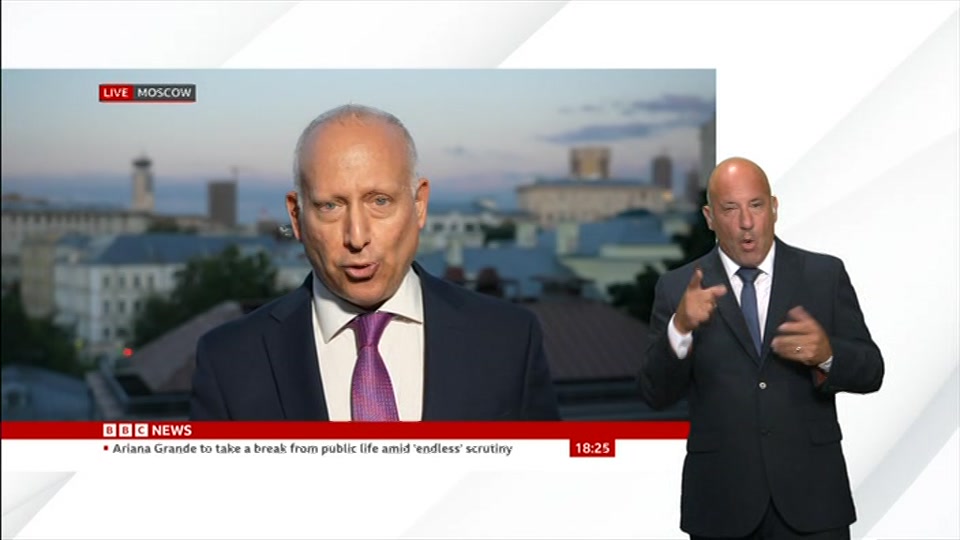 Broadcast still at 25m. BBC NEWS, Signed: BBC News at Six, 3 August 2026.
