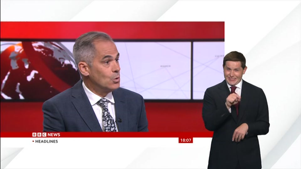 Broadcast still at 7m. BBC News, Signed: BBC News at Six, 18 August 2026.