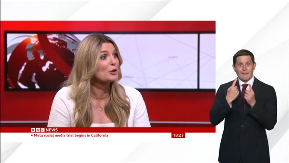 Broadcast still at 23m. BBC News, Signed: BBC News at Six, 18 August 2026.
